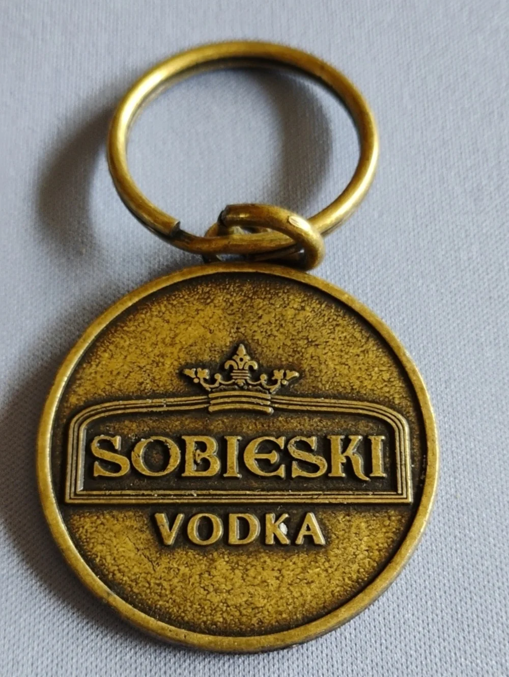Fisher House Bronze Keychain — Helping Military Families Sobieski Vodka